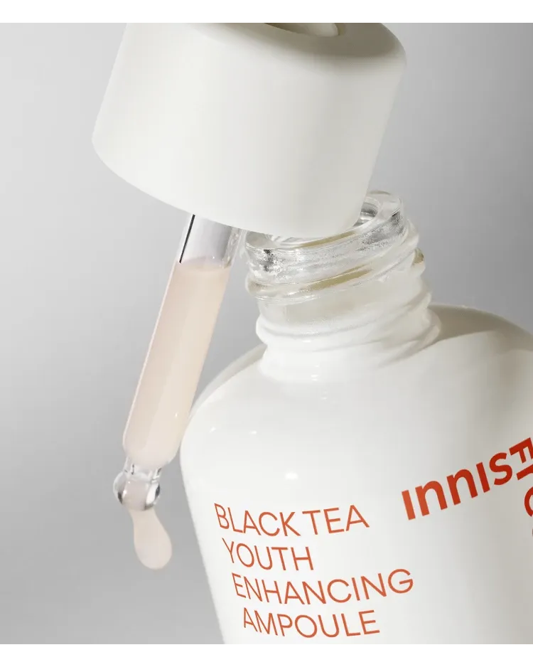 Innisfree Black Tea Youth Enhancing Ampoule — original dropper and formula-texture close-up.