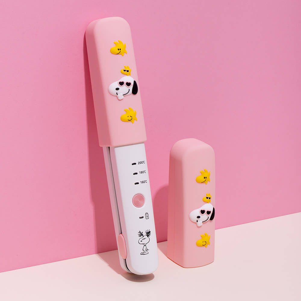 ROYCHE Snoopy wireless mini flat iron and matching silicone safety cap.