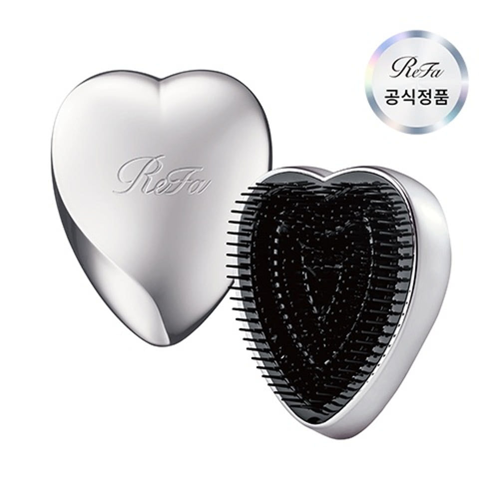 ReFa Heart Brush in Silver. One brush, shown from its design-facing view.