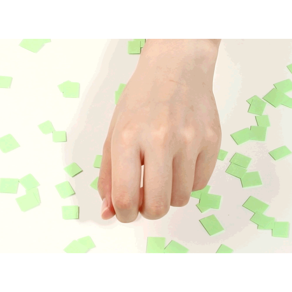 ROUND LAB Pine Calming Cica Airy Sun Stick: complete native manufacturer texture demonstration on a hand.