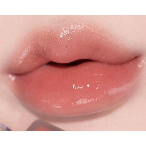 ALTERNATIVESTEREO Lip Potion Aqua Glow 02 Fig Candy, genuine named-shade lip swatch.