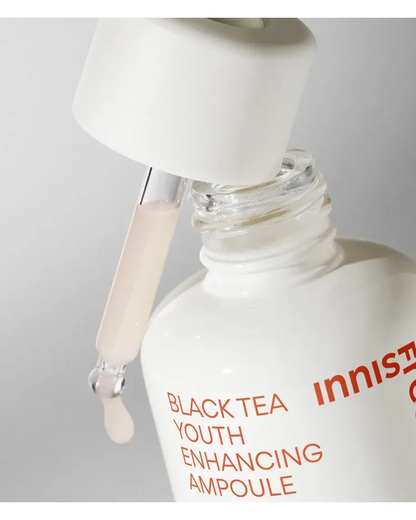 Innisfree Black Tea Youth Enhancing Ampoule — original dropper and formula-texture close-up.