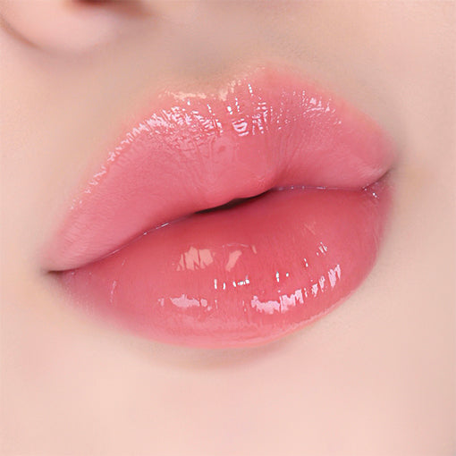 AMUSE Dew Tint 10 Peach Bunny original lip swatch.