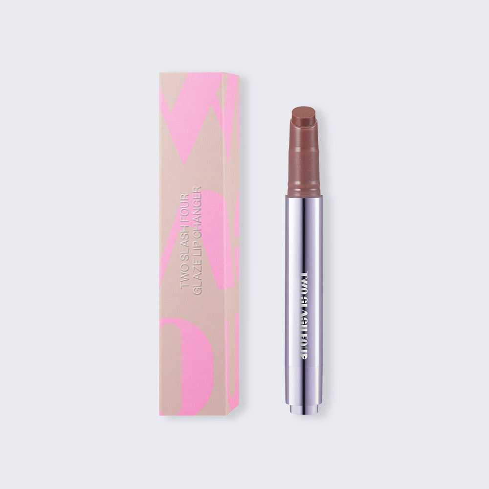 TWO SLASH FOUR Glaze Lip Changer Nu Coco, 2.7g tube with matching carton.
