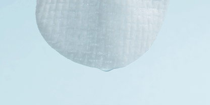 ROUND LAB Birch Juice Moisturizing Cleansing Pad essence-soaked sheet demonstration.