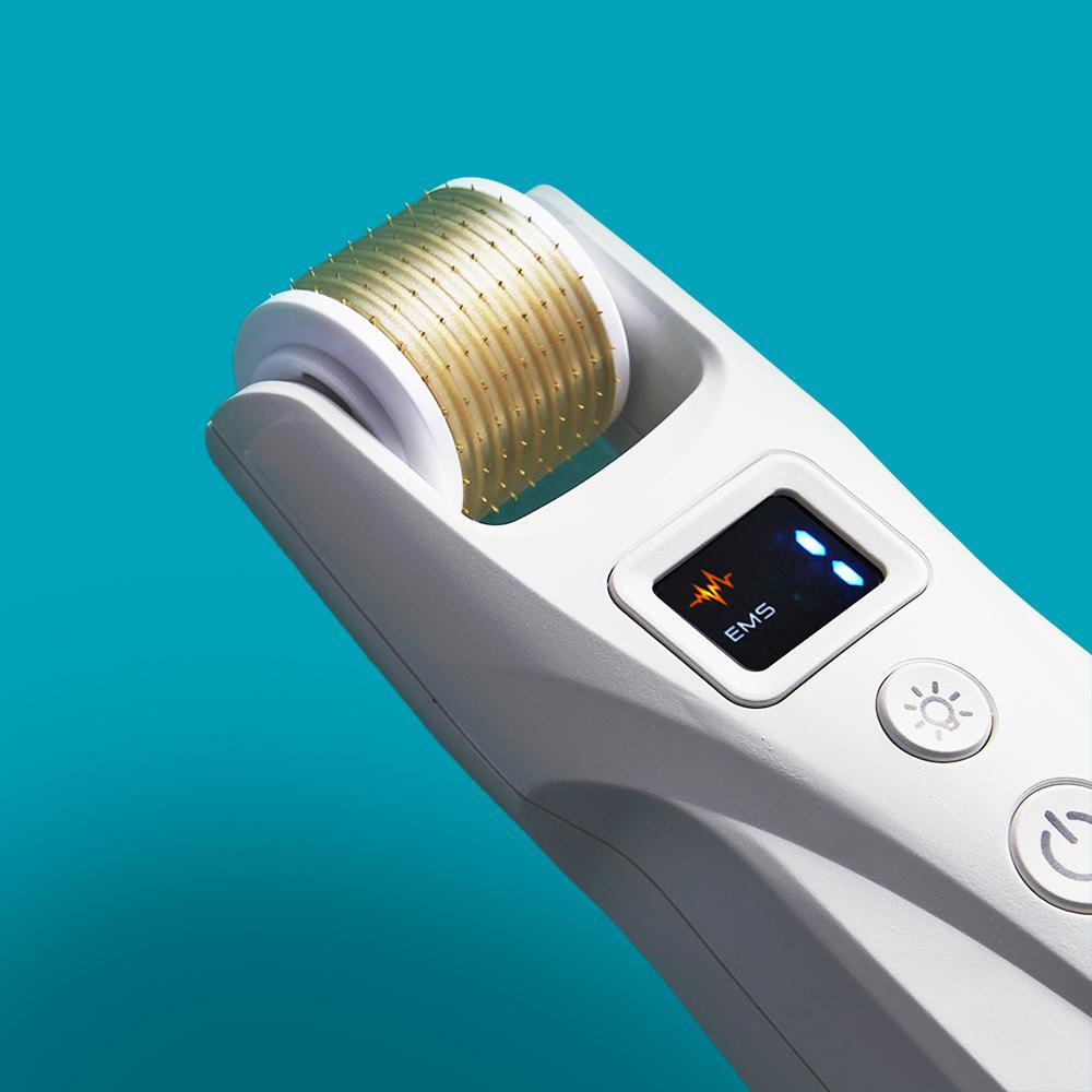 Close view of the Pore Shot microneedle roller and EMS display