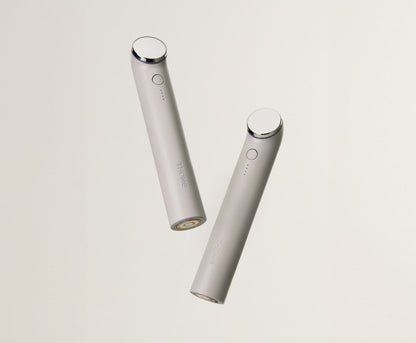 THOME The Glow Basic handheld beauty device, front and rear studio views.