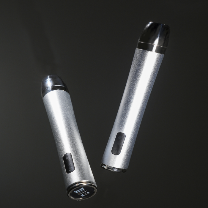 Glow.M Booster Sonic shown from the side and underside with its touch-base control.