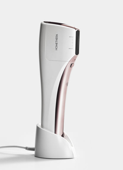 HOMETHERA device with its charging cradle in the manufacturer 2.0-package image.