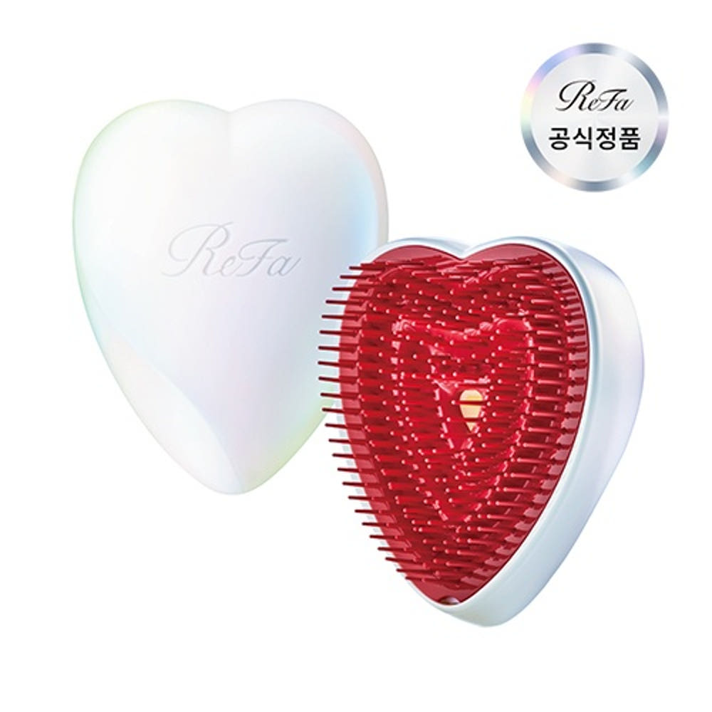 ReFa Heart Brush in Aurora White. One brush, shown from its design-facing view.