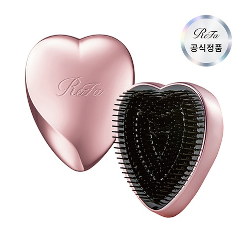 ReFa Heart Brush in Rose Gold. One brush, shown from its design-facing view.