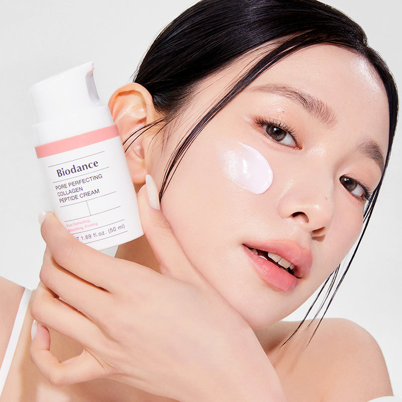 Biodance Collagen Peptide Cream texture applied to the cheek.