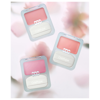 Actual Oddtype Oh Blur Cream Blush product-family photograph showing example shades; one selected-shade compact is supplied