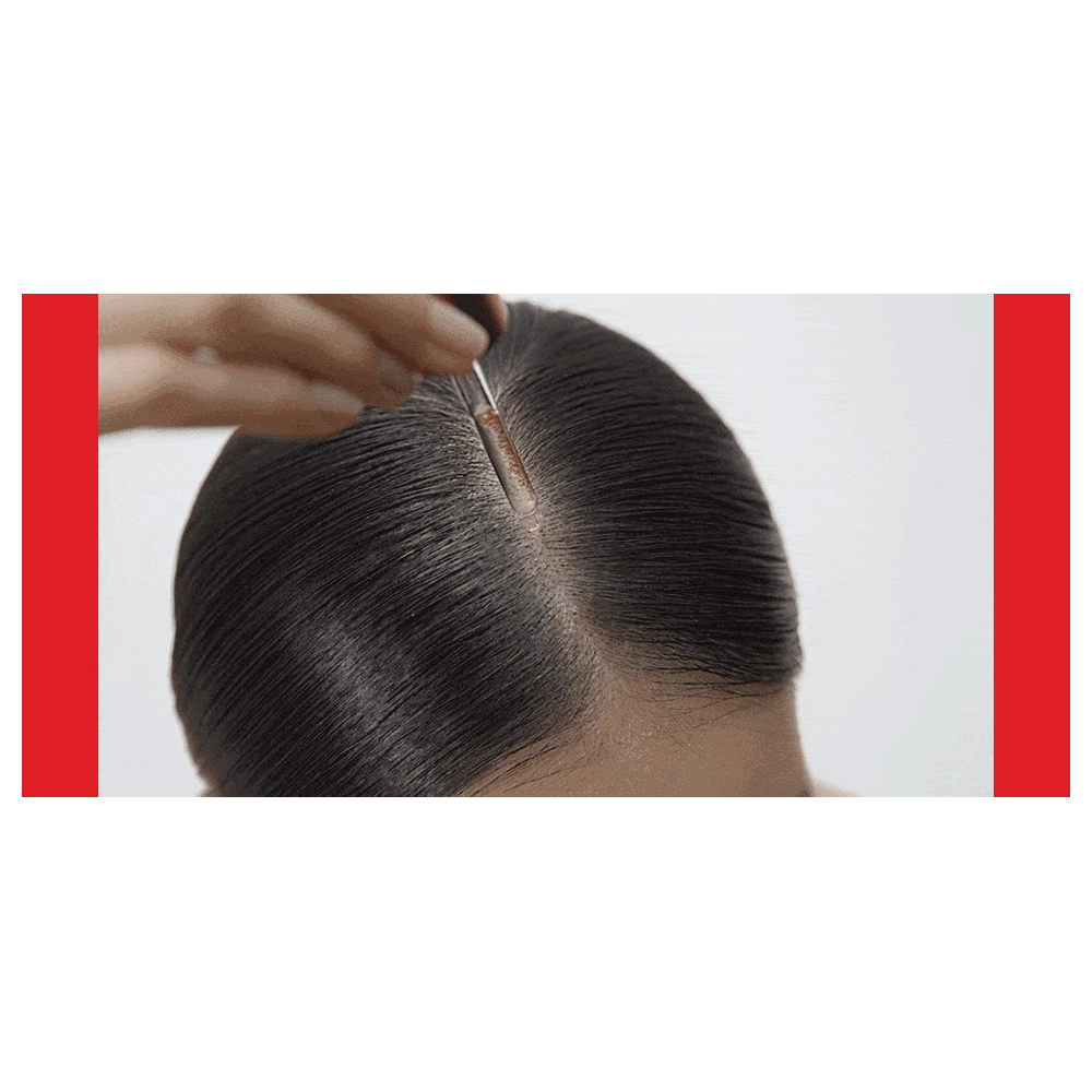 Actual Dr.FORHAIR scalp serum dropper application along the parted scalp