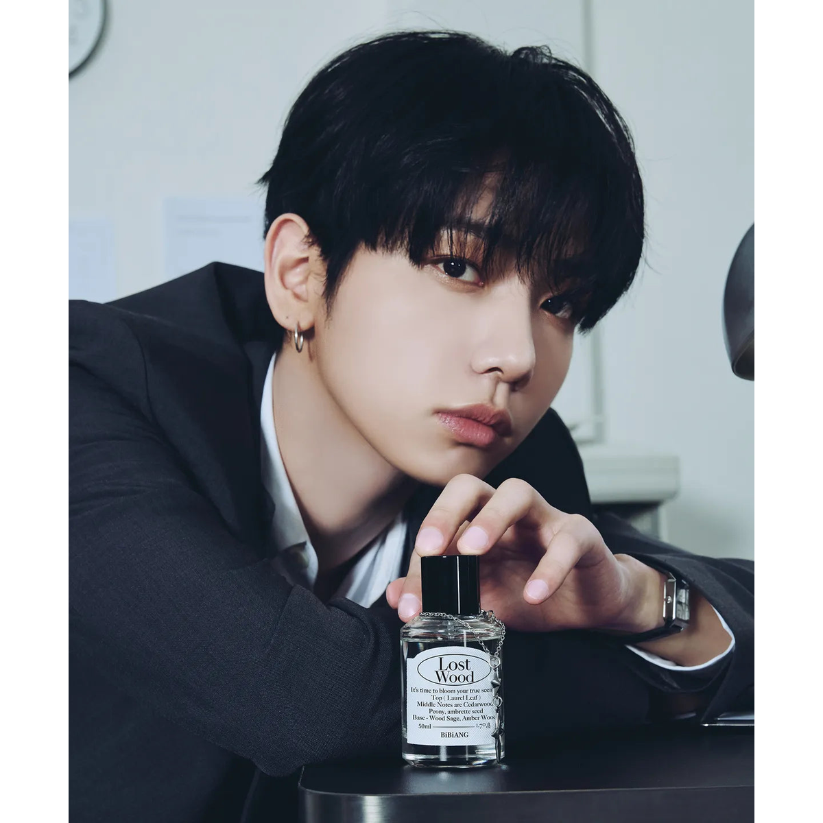 BIBIANG Lost Wood EDP 50ml: original brand campaign photograph showing the complete exact perfume bottle, model and labels preserved.