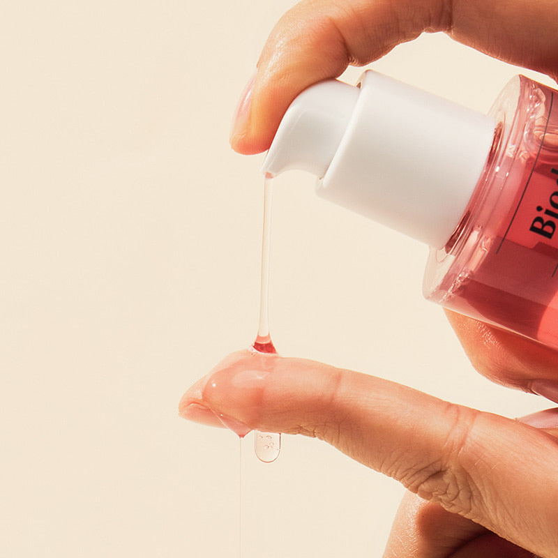 Biodance Pore Perfecting Collagen Peptide Serum: original pump dispenser and serum texture.