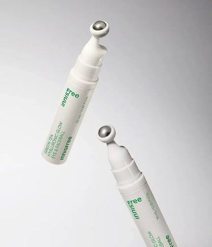 Innisfree Green Tea Hyaluronic Glow Eye &amp; Face Ball duo: two 10 ml rollers, one partially framed.