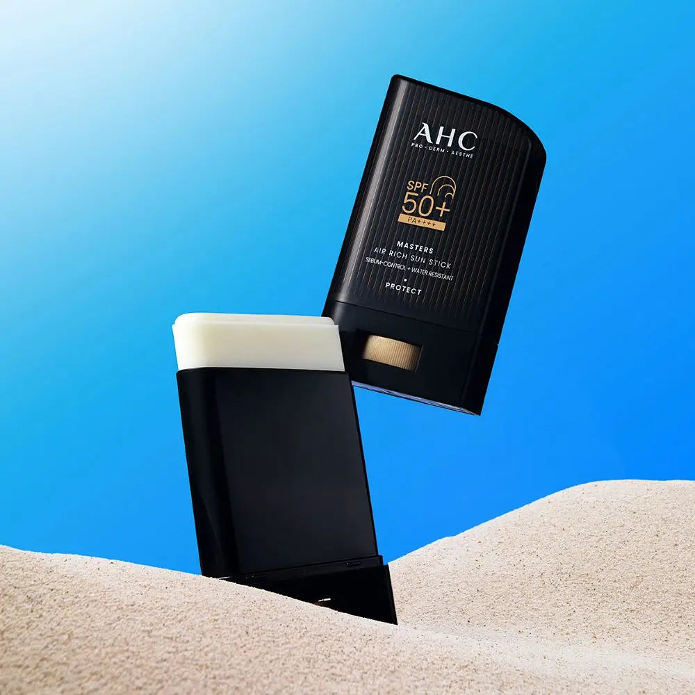 AHC Masters Air Rich Sun Stick 22 g: original black case, cap and exposed sun stick.
