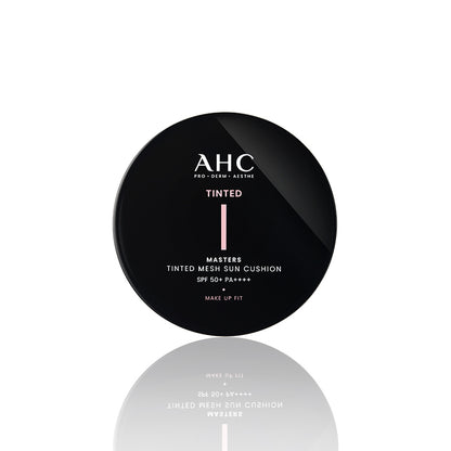 AHC Masters Tinted Mesh Sun Cushion: original closed black compact shared by both shade options; this image does not show a shade swatch.