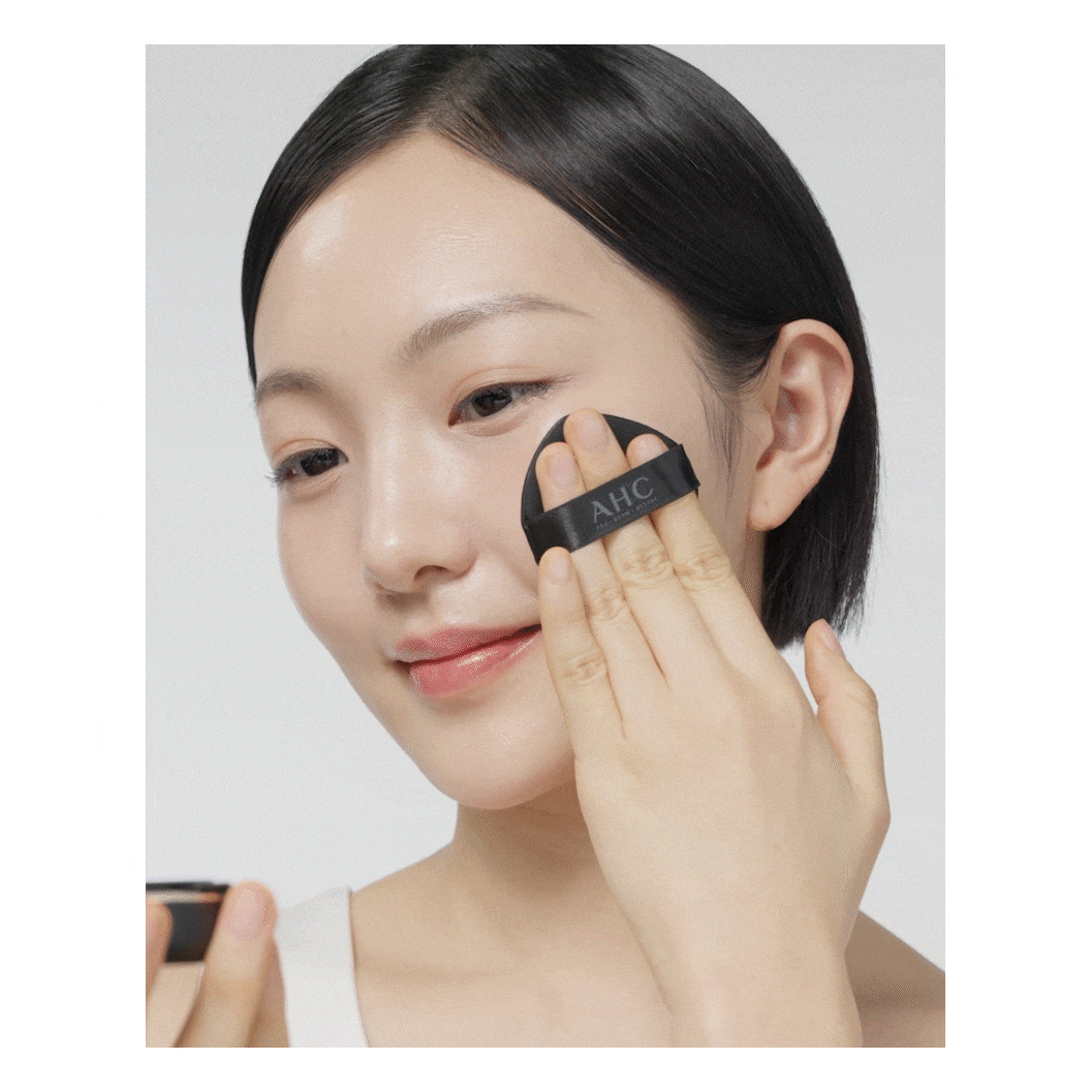 AHC Masters Tinted Mesh Sun Cushion: original puff application demonstration; shared manufacturer application image, not an individual shade swatch.