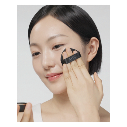 AHC Masters Tinted Mesh Sun Cushion: original puff application demonstration; shared manufacturer application image, not an individual shade swatch.