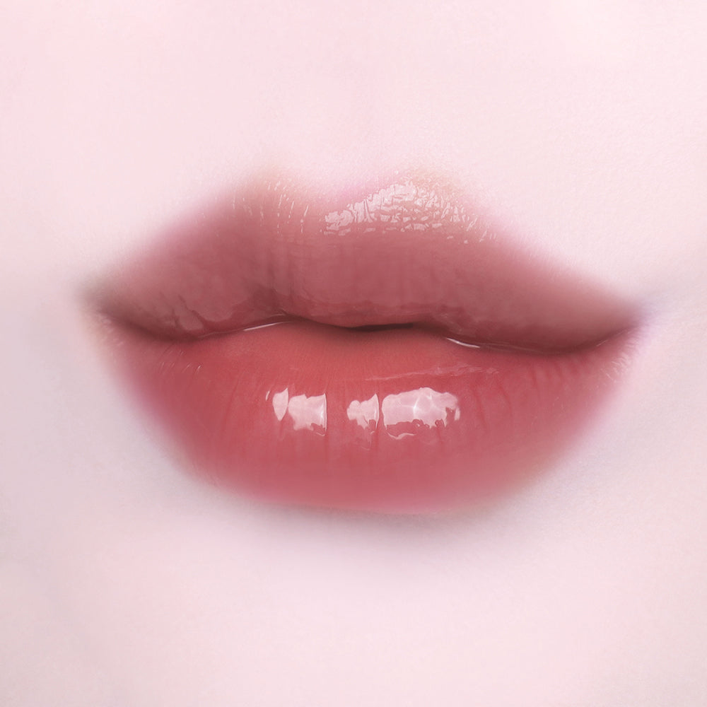 Dinto Frozen Lip Jelly 379 Crow original lip swatch; cosmetic finish demonstration.