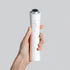P.CALM Clear Pro white PM-01 device with complete body, round treatment head and front button.