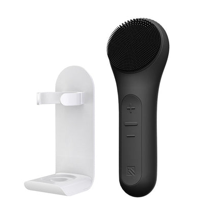 MELIENS ML-31 silicone vibration cleanser in Dark Black, with its included stand.