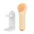 MELIENS ML-31 silicone vibration cleanser in Golden Beige, with its included stand.