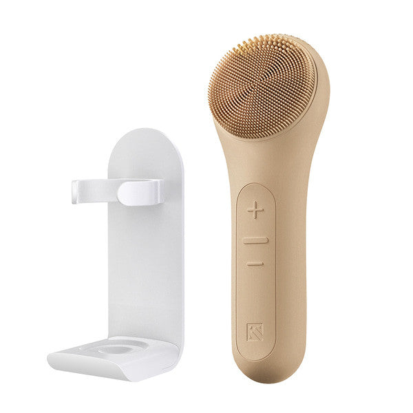 MELIENS ML-31 silicone vibration cleanser in Light Taupe, with its included stand.